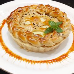 A picture of Veg bread pie.