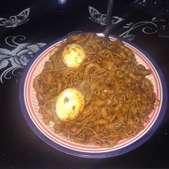 A picture of Pepper spag and macaroni with boiled eggs.
