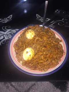 A picture of Pepper spag and macaroni with boiled eggs.