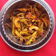 Bitter guards and cashew dry Subji (kaju karela Subji) A picture of Bitter guards and cashew dry Subji (kaju karela Subji).