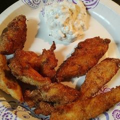 A picture of Cornbread Chicken Strips with Sauce.