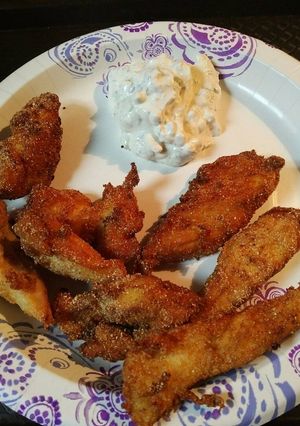 A picture of Cornbread Chicken Strips with Sauce.
