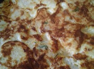 Una foto de Tortilla de papas con queso Full