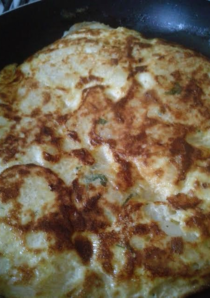 Una foto de Tortilla de papas con queso Full