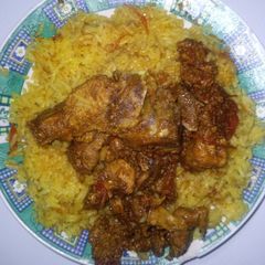 A picture of Pork stew with rice.
