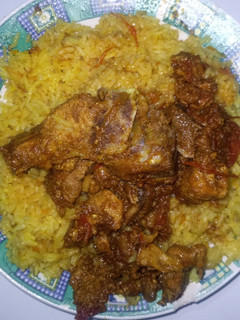 A picture of Pork stew with rice.