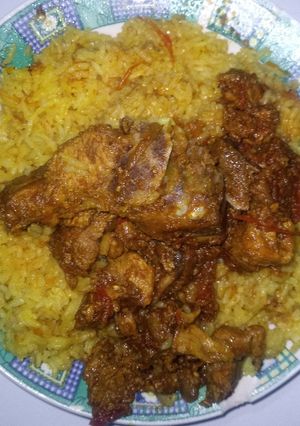A picture of Pork stew with rice.