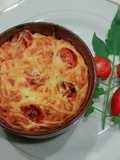 Suffle de merluza gratinada
