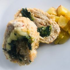 A picture of Polpettone ripieno con spinaci crudo e formaggio filante.