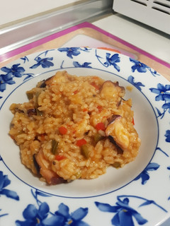 Una foto de Arroz meloso con pulpo y gambón