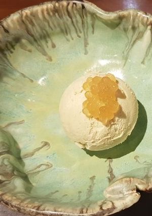 A picture of Avacado Ice-cream topped with Cavier.