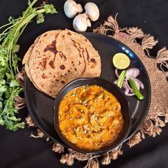 A picture of Mushroom Masala Curry.
