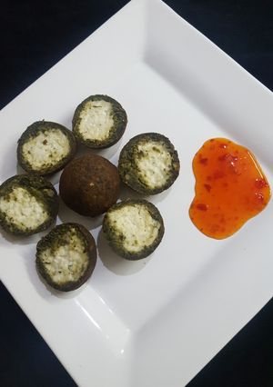 A picture of Paneer stuffed Spinach Balls.