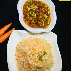 A picture of *CARROT RICE WITH VEGETABLES SAUCE*.