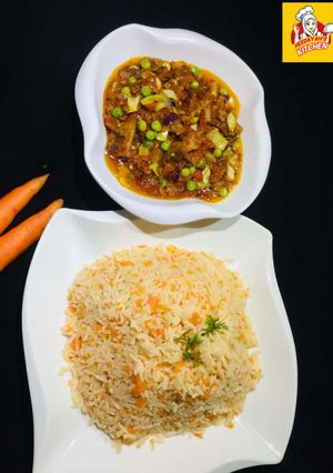 A picture of *CARROT RICE WITH VEGETABLES SAUCE*.
