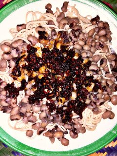 A picture of Spag with beans and black sauce.