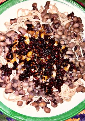 A picture of Spag with beans and black sauce.