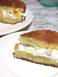 Una foto de Torta fácil de Crema y duraznos