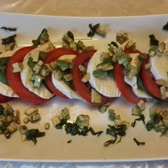 A picture of Caprese with avocado.