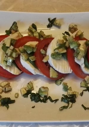 A picture of Caprese with avocado.