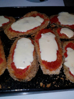 Una foto de Milanesas de berenjena a la napolitana