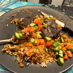 A picture of Stuffed Aubergine in Coconut Dal.