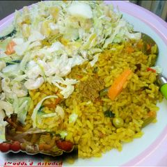A picture of Jallop rice with pasta salad.