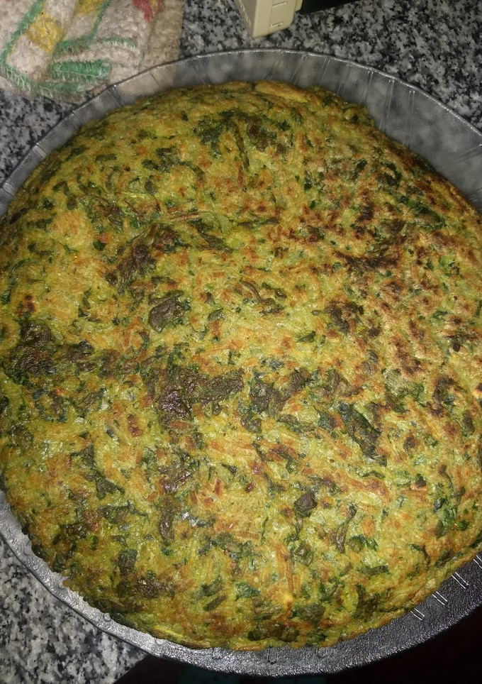 Una foto de Tortilla de arroz y espinaca