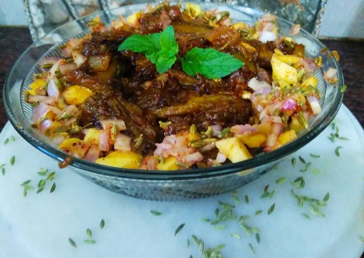 Tangy karela stuffed with mango