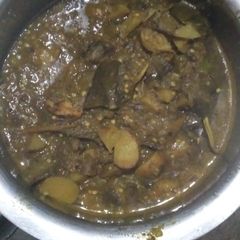 A picture of Potato and brinjals mix vegetable.