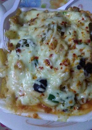 A picture of Cheesy fries.