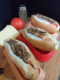 Una foto de Completos Napolitanos 🌭+🍕