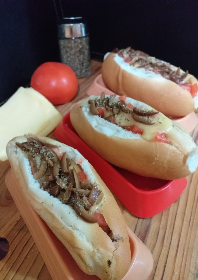 Una foto de Completos Napolitanos 🌭+🍕