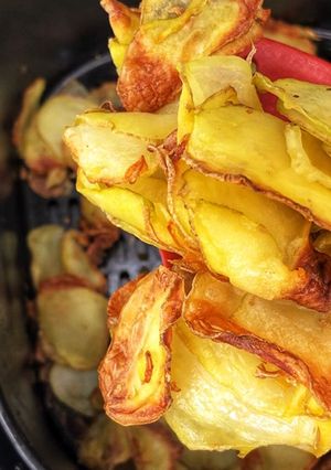 Una foto de Patatas chips en freidora de aire caliente AirFryer