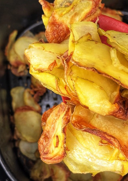 Una foto de Patatas chips en freidora de aire caliente AirFryer