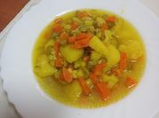 Una foto de sopa de papa y puerro