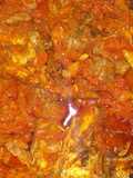 Red oil Guinea fowl stew