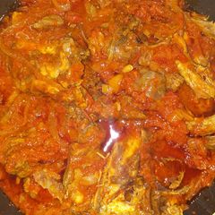 A picture of Red oil Guinea fowl stew.