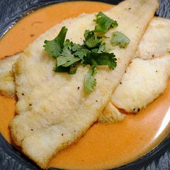 Pan-seared sole with tomato-coconut sauce A picture of Pan-seared sole with tomato-coconut sauce.