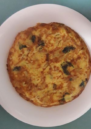 Una foto de Tortilla verde de espinacas y calabacín