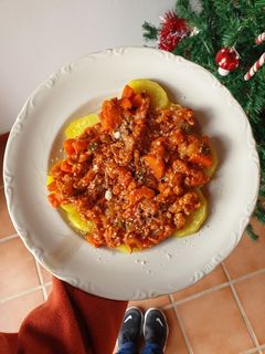 Una foto de Patatas a la boloñesa