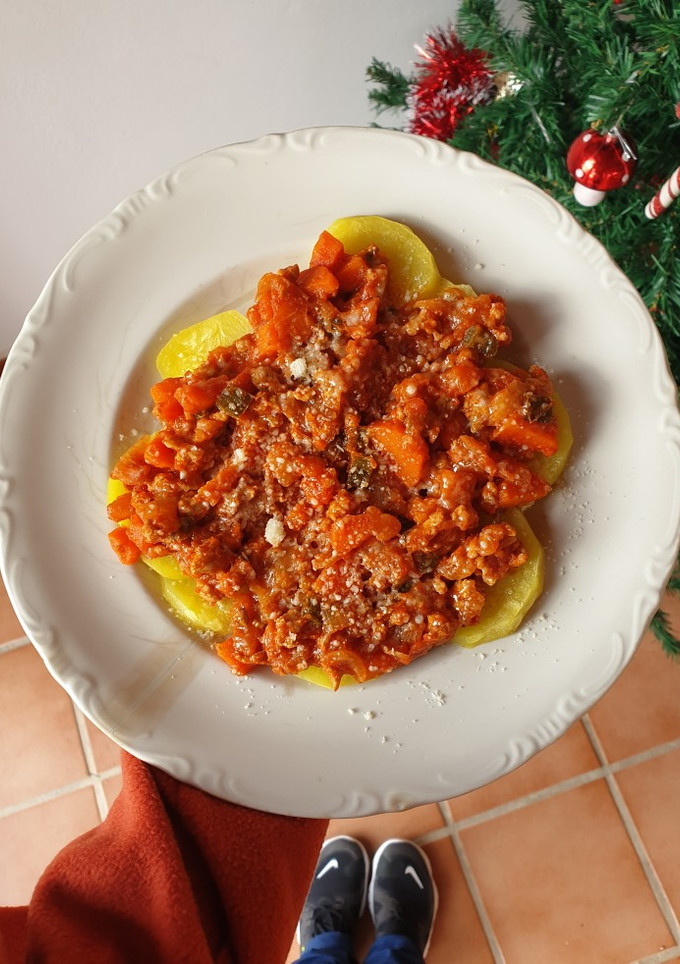 Una foto de Patatas a la boloñesa