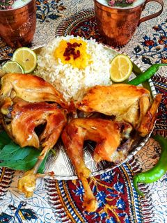 عکسی از دستور اکبر جوجه با سس رب انار و گردو