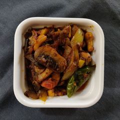 A picture of Mushroom Masala dry.