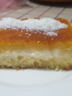 صورة لوصفة بسبوسة بالقشطة 🤤🍮