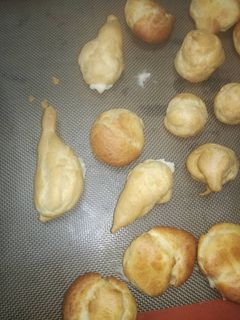 Una foto de Profiteroles y buñuelos rellenos de crema
