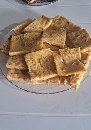 Una foto de Faina de cebollas y queso