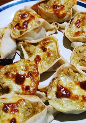 Una foto de Empanadas de coliflor y salsa blanca