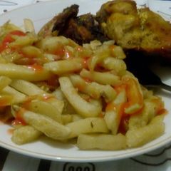 French fries with chicken A picture of French fries with chicken.