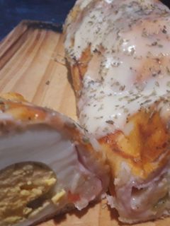 Una foto de Pizza rellena con #huevo